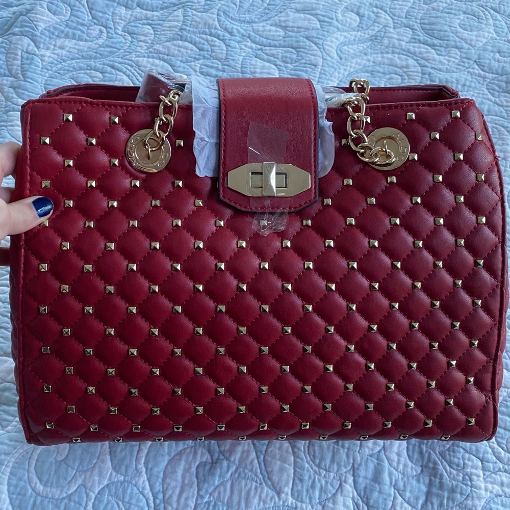 Red purse with gold chain